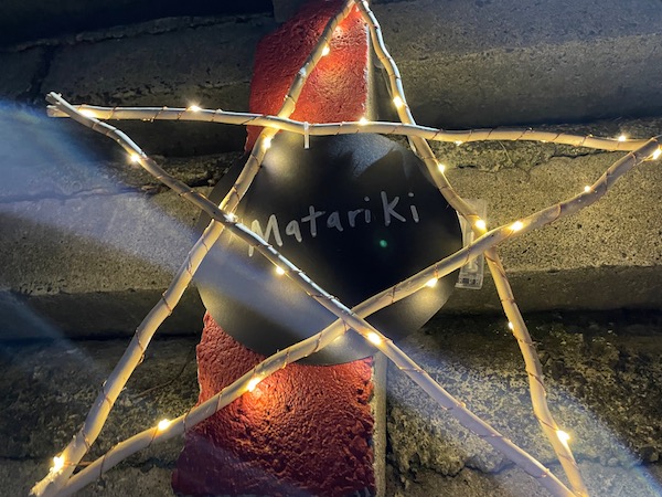 A light-covered star marks Matariki on the steps of Home St Reserve, Arch Hill
